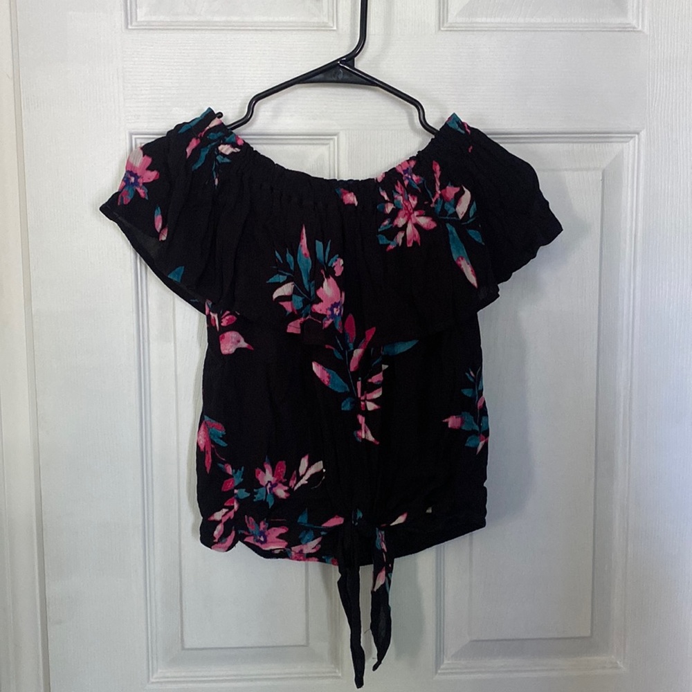 Express off the shoulder top with stretchy bottom and a tie accent